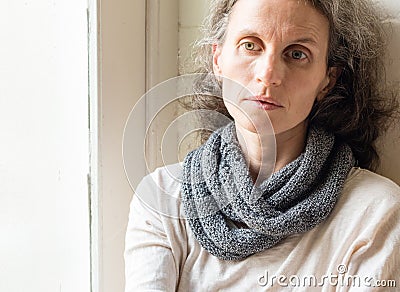 Sad middle aged woman Stock Photo