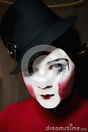 Sad mime in a hat Stock Photo