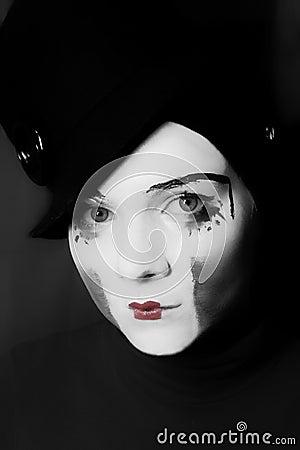 Sad mime in hat Stock Photo