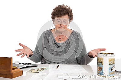 Sad pensioner woman have money problems - poverty in the age. Stock Photo