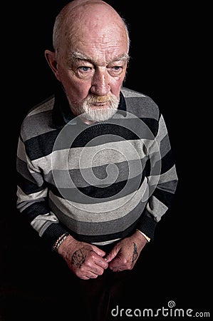 A sad senior person alone Stock Photo