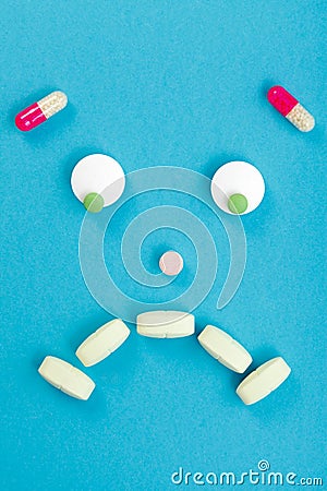 Sad smileyface made of pills Stock Photo