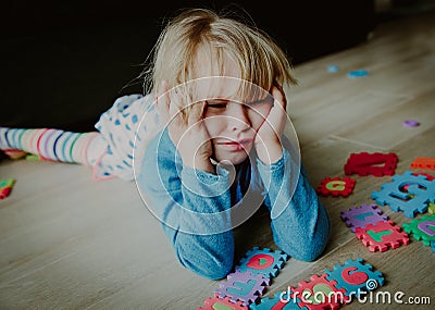 Sad stressed little girl, despair Stock Photo