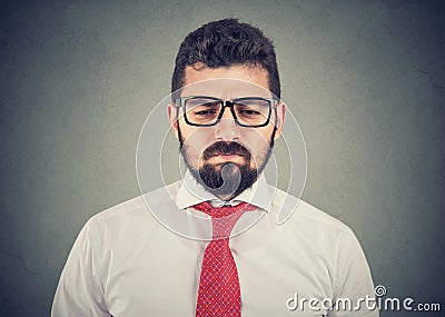 Sad thoughtful worried young businessman Stock Photo