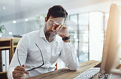 Sad, tired and a man at work with burnout, career problem or anxiety from deadline. Corporate, working and a businessman Stock Photo