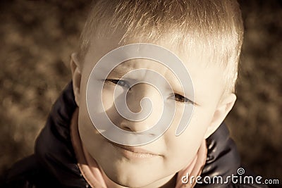 Sad upset unhappy little child (boy) Stock Photo