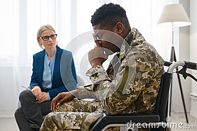 Military man with disability at therapy session Stock Photo
