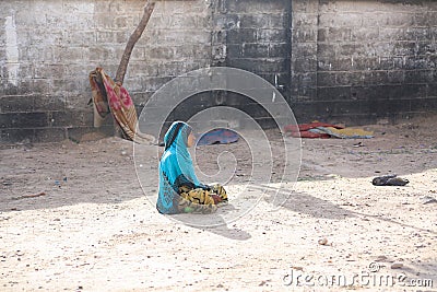 A sad woman in a camp for displaced people from the Yemen war Editorial Stock Photo