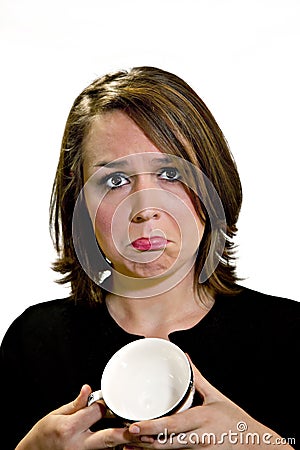 Sad Woman With Empty Coffee Cup Stock Photo