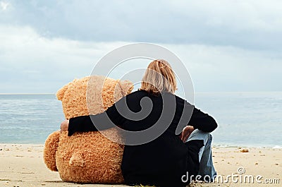 Sad woman and imaginary friend Stock Photo