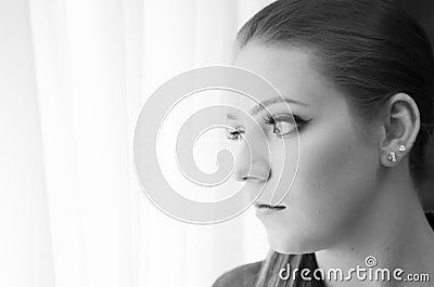 Sad woman looking out Stock Photo