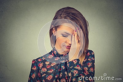 Sad young beautiful woman with worried stressed face expression Stock Photo