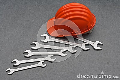 Safety gear and wrenches Stock Photo