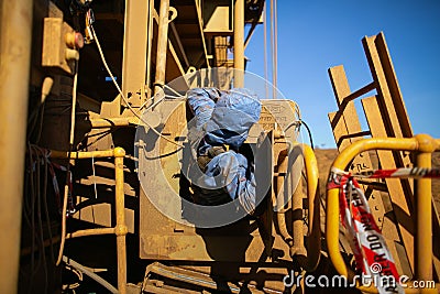 Safety harness disposable protective clothing into connecting Karabiner which attached harness loop Stock Photo