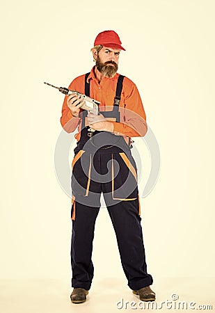 Safety measures. Powerful drill. Buy drill. Toolbox tips drilling and fixing. Man in cap with drills white background Stock Photo