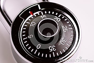 Safety or security concept, close up of code numbers on combination pad lock, locking device in which a sequence of symbols or nu Stock Photo