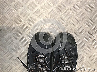 Safety shoes with metal background Stock Photo