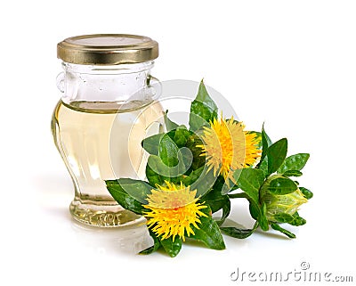 Safflower plant with oil in the bottle. Stock Photo