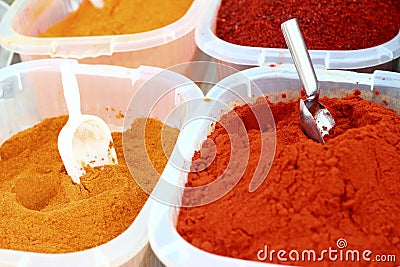 Saffron paprika curry yellow orange spices Stock Photo