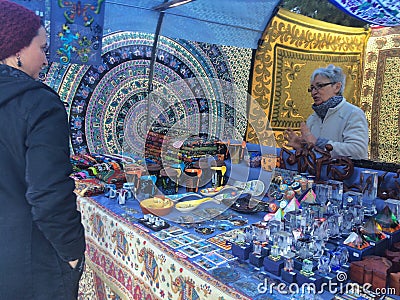 SAGRADA FAMILIA, BARCELONA, December 2015-street sellers sale souvenirs a front of Sagrada familia Editorial Stock Photo