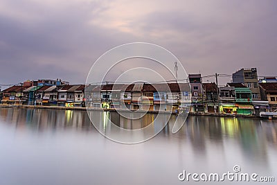 SAI GON, VIET NAM- MAY 04, 2015: ancient riverside city with house boat in Ben Binh Dong, Saigon, VietNam Editorial Stock Photo