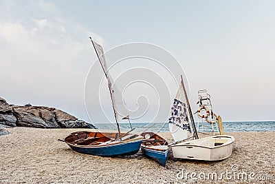 Sail Boats Sea Shore Lifesaver Flotation Life Buoy Rock Formation Concept Stock Photo