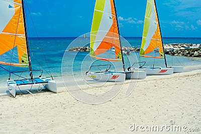 Sail Boats waiting on the shore in Jamaica Stock Photo