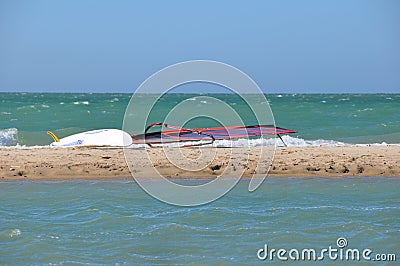 Sailboard on the sand Stock Photo