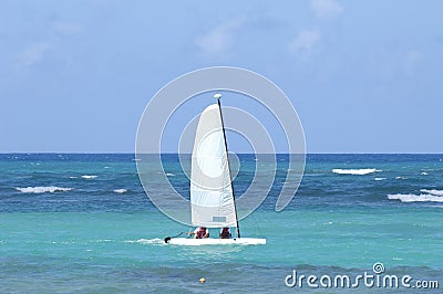 Sailboat on the blue caribbean sea. Stock Photo