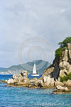 Sailboat in coastal scenery Stock Photo