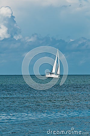 Sailboat cruising in the gulf of mexico on a clear, windy day Stock Photo