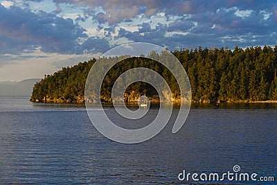 Sailboat in Desolation Sound British Columbia Canada at sunset Stock Photo