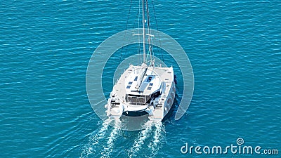 Sailboat gliding across the open ocean Stock Photo