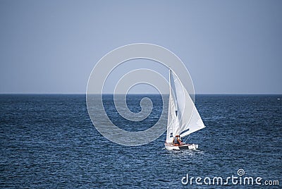 Sailboat gliding over the ocean Stock Photo