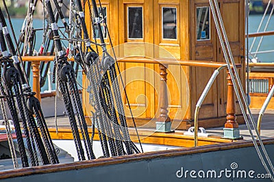 Sailboat masts, rigging and rolled up sails Stock Photo