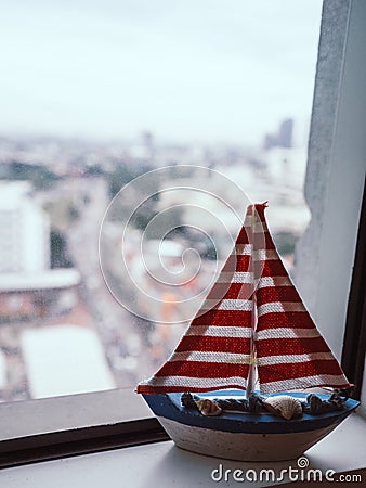 Sailboat model on window. Stock Photo
