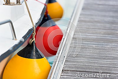 Sailboat Side Fenders CloseUp. Boat protection Stock Photo