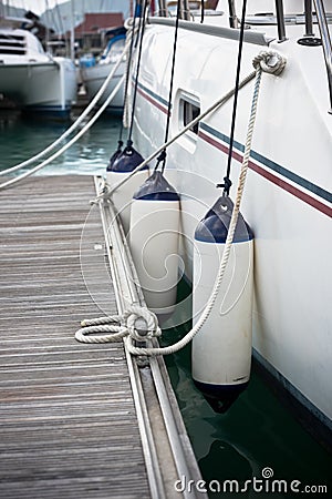 Sailboat Side Fenders CloseUp. Boat protection Stock Photo