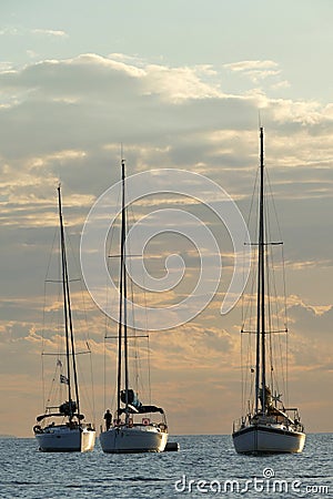 Sailboats in the bay of Cape Sounio where the temple of Poseidon is located Editorial Stock Photo