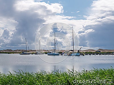 Sailboats in harbour of Marker Wadden island in Markermeer, Netherlands Stock Photo