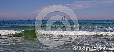Seascape. Summer, sea, sun, beach, holiday, fun. Sailboats on the horizon - Black Sea, landmark attraction in Romania Stock Photo