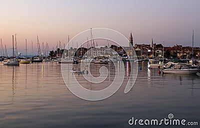 Sailboats in Izola harbor. Small town and its marina, located in the Southwestern Slovenia on the Adriatic coast. Stock Photo