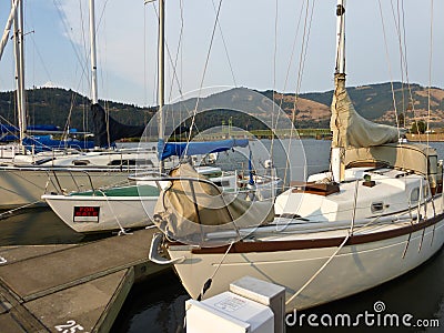 Sailboats Moored at a Dock on on Oregon River Editorial Stock Photo