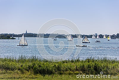 Sailboats and sloops on the lake the Kaag in the Netherlands Stock Photo