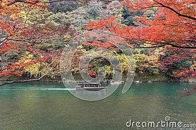 Sailing boat in autumn, Arashiyama, Kyoto, Japan Stock Photo