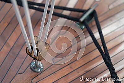 Pulley and rope on old sailing ship Stock Photo