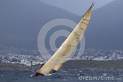 A sailing boat sailing in strong wind and on the rough sea in Bodrum Editorial Stock Photo