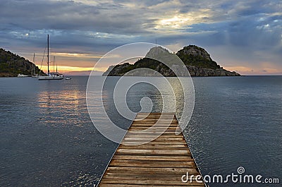 Sailing Boat at Sunset Stock Photo