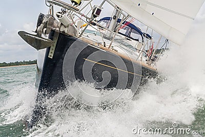 Sailing Boat Yacht in Rough Seas Stock Photo