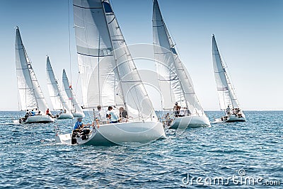 Sailing boats on the start line of regatta Stock Photo